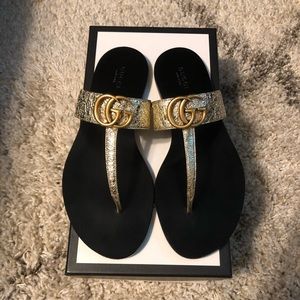 Gucci Marmont Leather Thong Sandals in Metallic Gold, Size 38.5